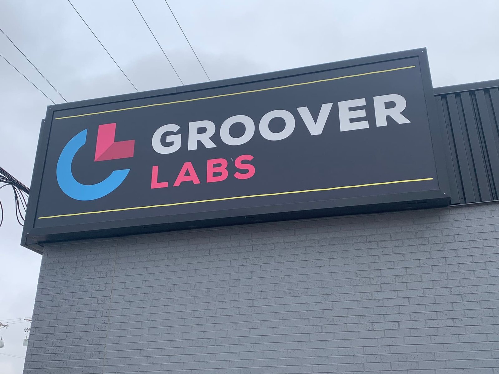 Groover Labs lit cabinet sign